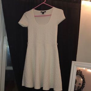 White dress with embroidered flowers